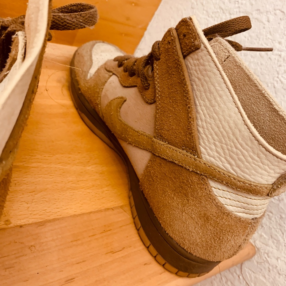 Worn Nike dunk high shoes.